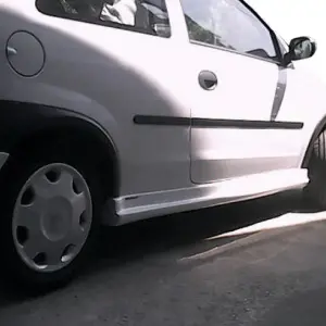 Бічні спідниці (під фарбування) для Opel Corsa C 2000–2006