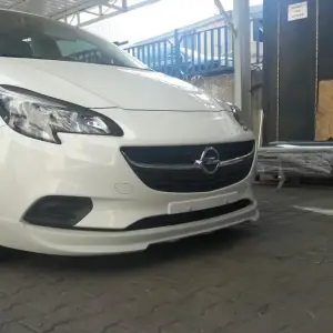 Передня нижня накладка (під фарбування) для Opel Corsa E 2015–2019