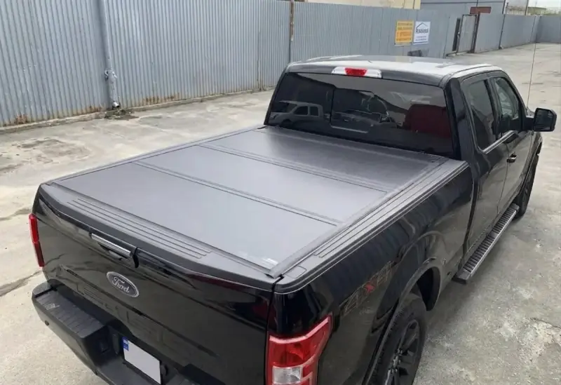 Кришка в кузов 4-х секційна (2011-2015) для Toyota Hilux 2006–2015