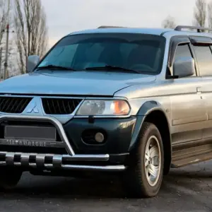 Передній захист ST015↗WT (нерж) для Mitsubishi Pajero Sport 1996–2007