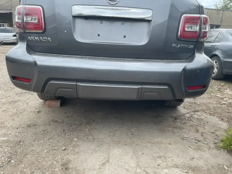 Задній бампер в зборі (оригінал 2019 рік) для Nissan Armada 2016–2024