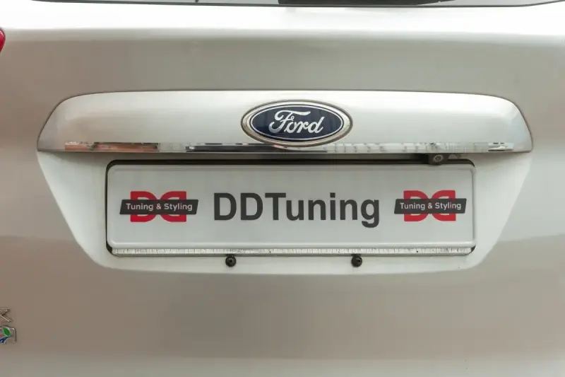 Планка над номером Carmos (нерж.) для Ford C-Max/Grand C-Max 2010–2019