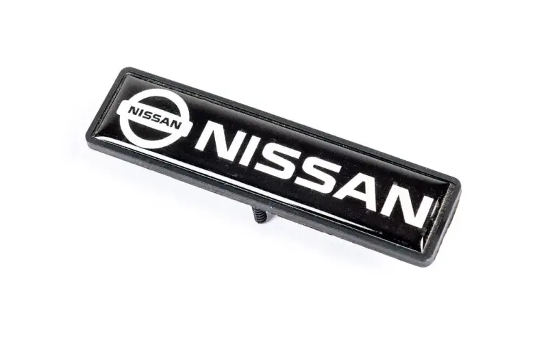 Шильдик для килимків (1шт) для Nissan