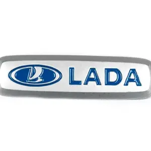 Шильдик алюмінієвий для килимків (1шт) для Lada